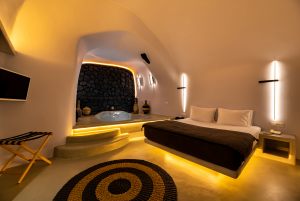 nostos-apartments-luxury-bedroom-bed-interior-cave-house (1)
